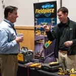 Daniel Blosser talking with Fieldpiece vendor at the RBI 2022 Service Team Appreciation Breakfast