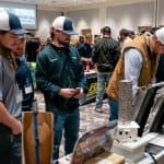 employees looking at vendor tables at the RBI 2022 Service Team Appreciation Breakfast