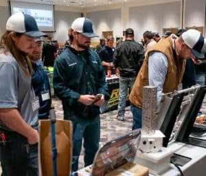 employees looking at vendor tables at the RBI 2022 Service Team Appreciation Breakfast