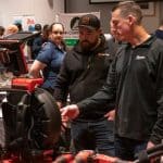 employee talking with vendor at the RBI 2022 Service Team Appreciation Breakfast