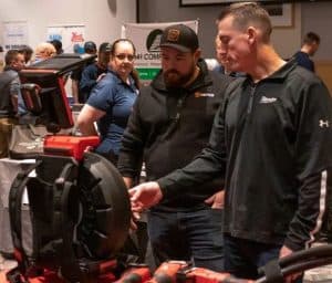 employee talking with vendor at the RBI 2022 Service Team Appreciation Breakfast