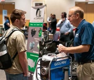 vendor talking with employee at the RBI 2022 Service Team Appreciation Breakfast