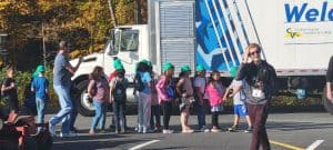 RBI staff at William Monroe High School career fair with young students.