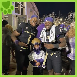 RBI's Top Dog Winner with two JMU football players