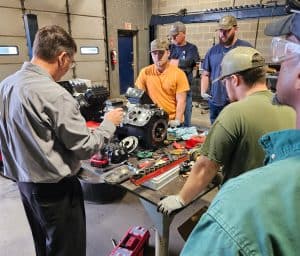 RBI techs learning in our garage area