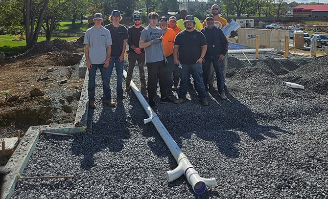 RBI-About-Community-2023-Habitat-Houses RBI team building habitat houses