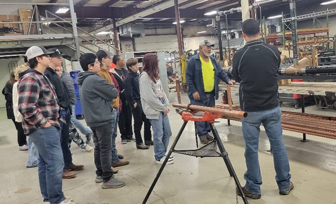 RBI-About-Community-2024-Greene-Co-Tech-Tour Students touring RBI's fabrication shop