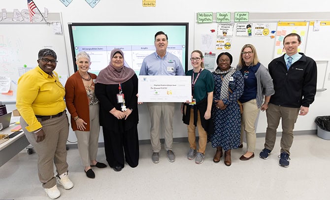 RBI-About-Community-2024-Harrisonburg-Public-Schools RBI president with Harrisonburg Schools Foundation