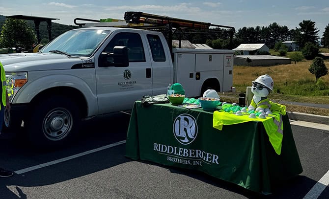 RBI-About-Community-2024-Touch-a-Truck RBI truck and table set up at touch-a-truck event