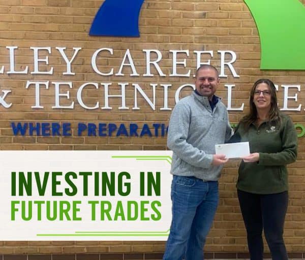 Investing in Future Trades. RBI staffing recruiter, Shara, handing a check to HVACR instructor, Doug Smith.