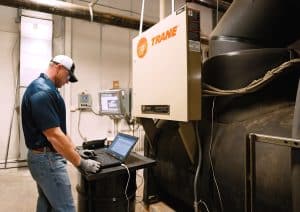 RBI employee analyzing equipment test results