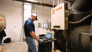 RBI employee analyzing equipment test results